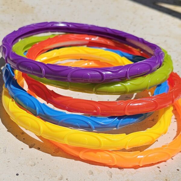 Aros plásticos chicos 6 colores vivos sumergibles